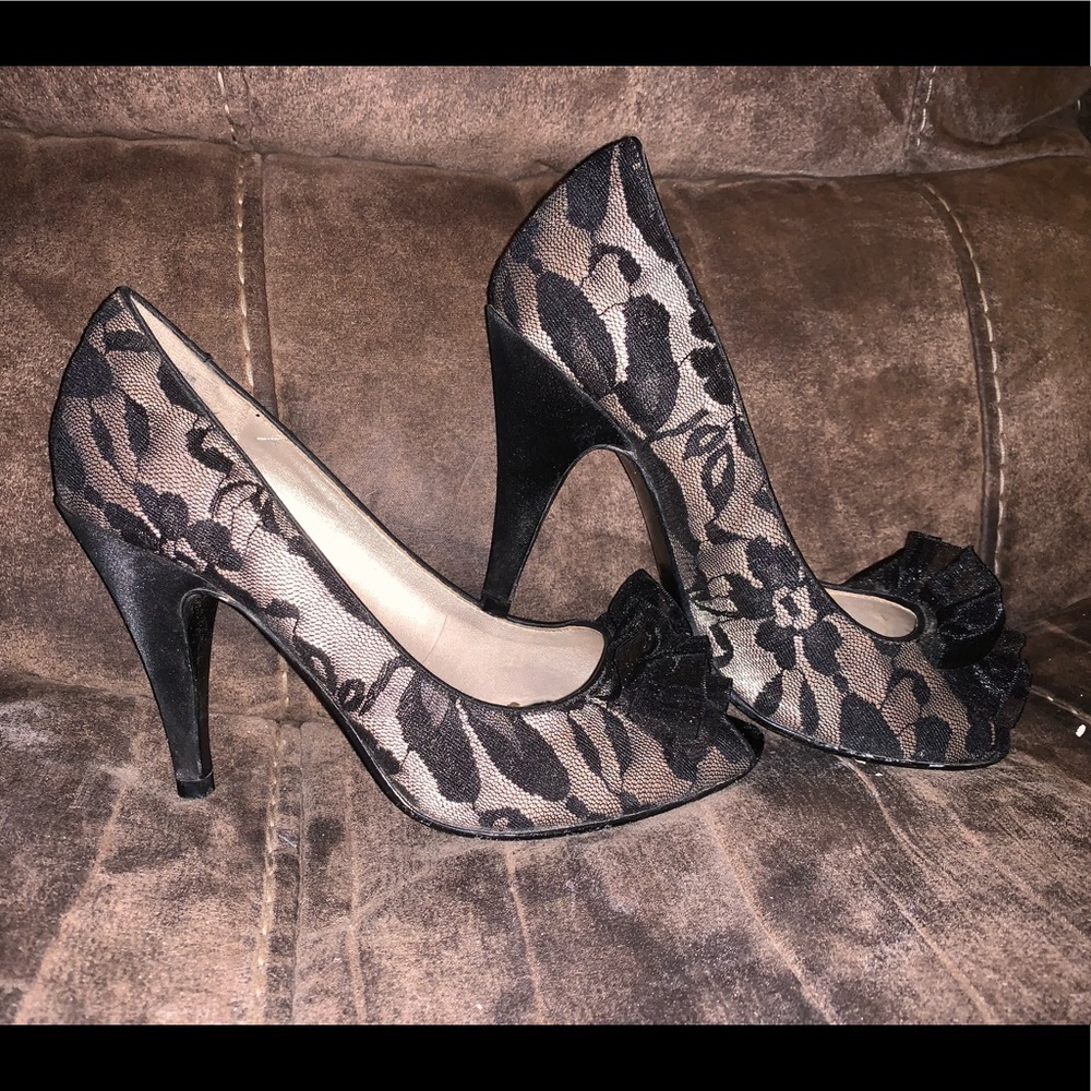 Unlisted black and gold stilettos